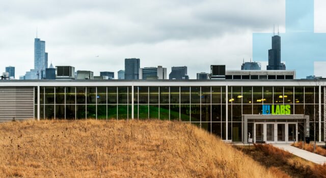 UI Labs Building with Chicago skyline in background