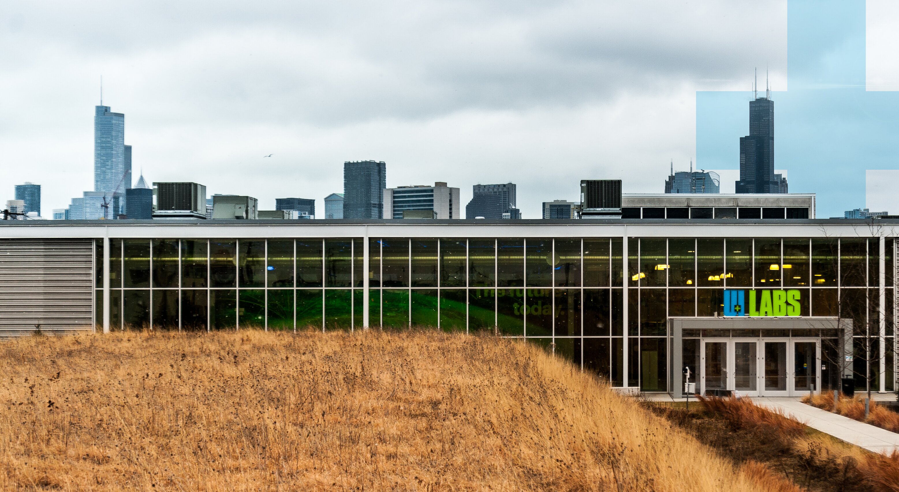 UI Labs Building with Chicago skyline in background